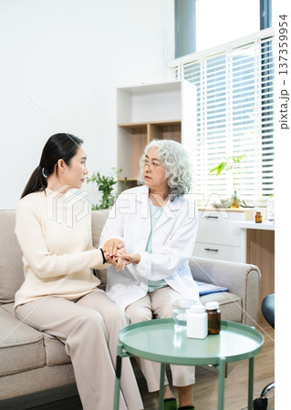 Psychiatrist comforting stressed patient during mental health therapy. Psychology counseling, emotional support, depression and anxiety treatment Psychiatrist comforting stressed patient during mental health therapy. Psychology counseling, emotional support, depression and anxiety treatment 137359954
