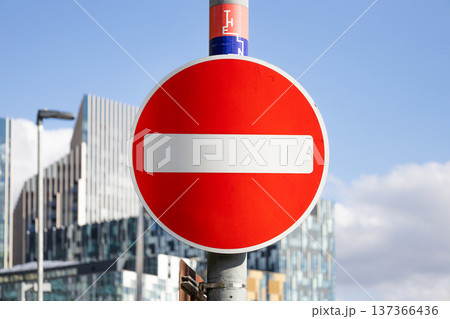 Restricted area marked by no entry street sign 137366436