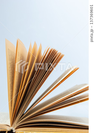 open book on pile of books background shcool study book. The concept of reading literature, education and book publishing. Free space for text 137369601