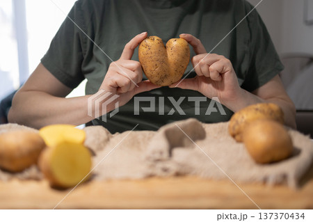 Rustic Cuisine Scene With Gardener Embracing Earthy Textures And Sustainable Food Practices Rustic Cuisine Scene With Gardener Embracing Earthy Textures And Sustainable Food Practices 137370434