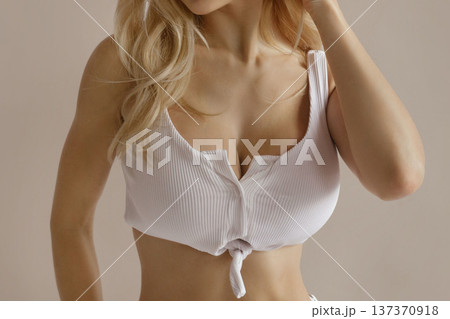 Sexy beauty concept with attractive busty woman in white lingerie, cleavage and feminine body aesthetics 137370918