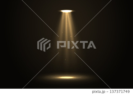 Dramatic golden spotlight beam in dark empty space Dramatic golden spotlight beam in dark empty space 137371749