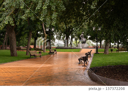 City Park Pathway with Monument After Rain 137372208