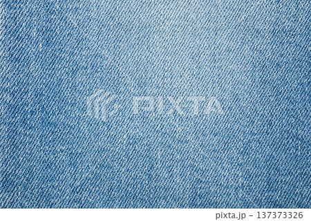 Old denim blue jeans fabric texture background Old denim blue jeans fabric texture background 137373326