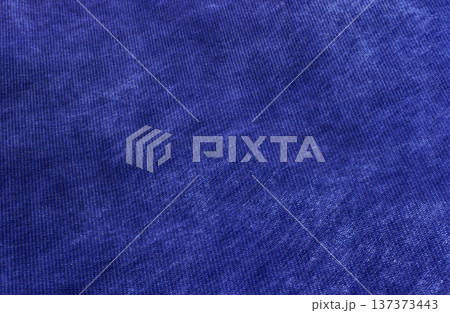 バナーや背景に最適な、落ち着いた紺色のファブリック調デザイン素材 137373443