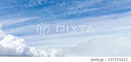 Peaceful sky with wispy clouds, great for design or relaxation themes 137374221