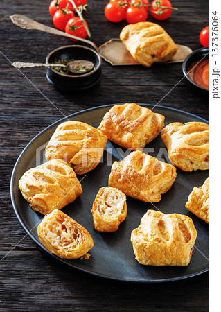 Top view of puff pastry rolls with ham and cheese Top view of puff pastry rolls with ham and cheese 137376064