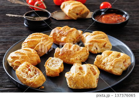 Top view of puff pastry rolls with ham and cheese Top view of puff pastry rolls with ham and cheese 137376065