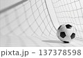 Soccer ball in goal net black and white monochrome sports photography concept background 137378598