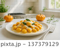 Gourmet Pumpkin Dumplings with Fresh Sage and Cream 137379129