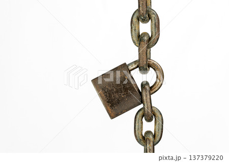 Locked padlock on rusty chain with copy space isolated on white background 137379220