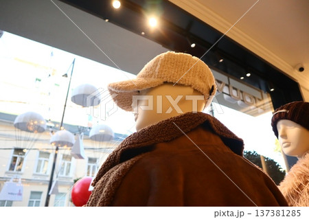 Close-up of a sleek mannequin head in a retail store. 137381285