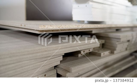 Close-up of stacked laminated particle boards for furniture manufacturing. 137384912