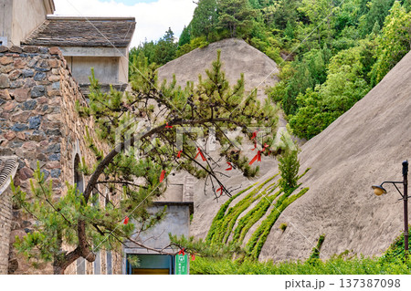 The ancient water town of Gubei near the site of the Great Wall of Simatai on a clear summer day. 137387098