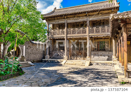 The ancient water town of Gubei near the site of the Great Wall of Simatai on a clear summer day. 137387104