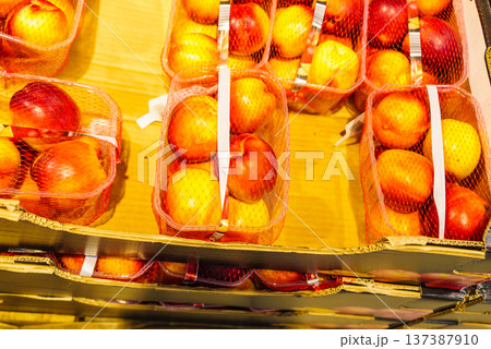 Peach nectarines boxes in shop Peach nectarines boxes in shop 137387910