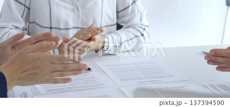 Business team clapping hands, celebrating contract signing after successful negotiation 137394590