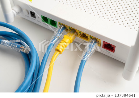 Ethernet cable with wireless router connect to internet service provider network. Ethernet cable with wireless router connect to internet service provider network. 137394641