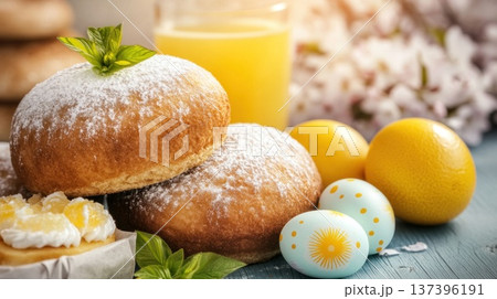 Freshly baked sweet buns with Easter eggs and juice on wooden table 137396191
