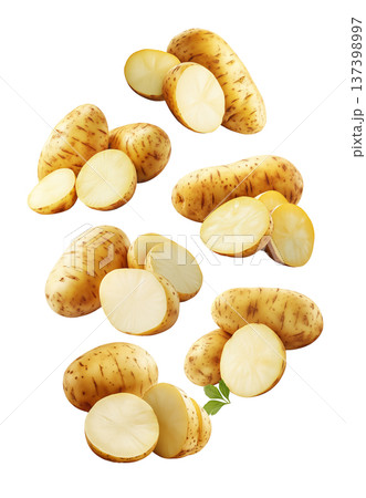 Fresh raw potatoes with skin, scattered and isolated on white background, concept of organic food ingredients 137398997