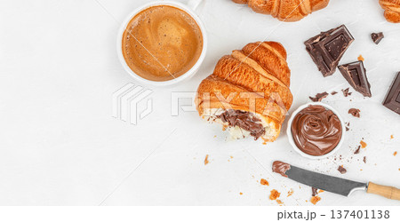 Croissant with Chocolate Spread and Coffee Top View Breakfast Croissant with Chocolate Spread and Coffee Top View Breakfast 137401138