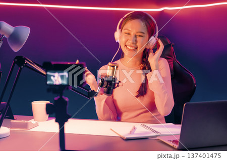 Host channel of creative broadcaster living by smartphone with guest. Stratagem. 137401475