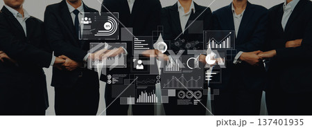 Business team in formal suits with digital interface displaying graphs, charts, and data analytics, representing collaboration in a corporate environment Trope 137401935