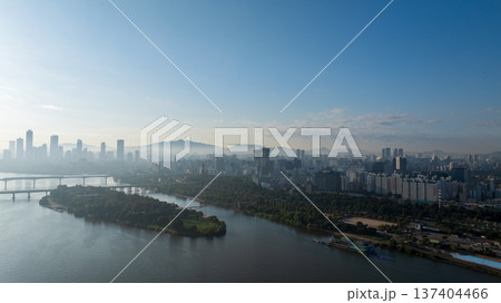 Aerial cinematic sunrise over Seonyudo Park and Hangang River with Yeouido skyline, Seoul. 137404466