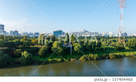 Aerial cinematic sunrise over Seonyudo Park and Hangang River with Yeouido skyline, Seoul. 137404468
