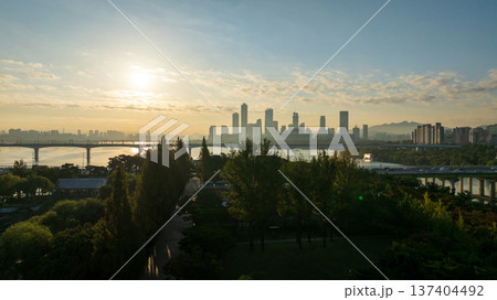 Aerial cinematic sunrise over Seonyudo Park and Hangang River with Yeouido skyline, Seoul. 137404492