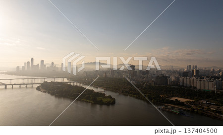 Aerial cinematic sunrise over Seonyudo Park and Hangang River with Yeouido skyline, Seoul. 137404500