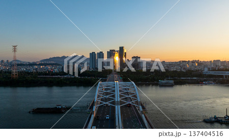 Aerial cinematic sunrise over Seonyudo Park and Hangang River with Yeouido skyline, Seoul. 137404516