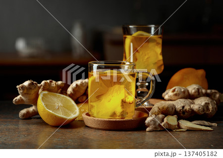 Ginger tea with lemon on a kitchen table. 137405182