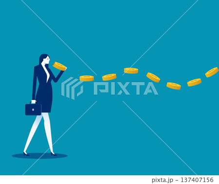 Greedy. Businesswoman eating string of gold coins  held in hand 137407156