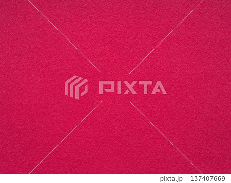 A vibrant magenta felt surface exudes a warm and tactile aesthetic 137407669