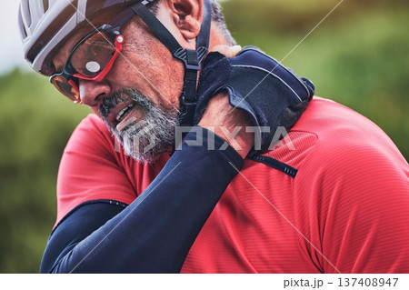 Man, cyclist and neck injury in sports accident, emergency or broken bone and fitness in nature. Closeup of male person or athlete with sore pain, ache or joint inflammation from cycling or fall Man, cyclist and neck injury in sports accident, emergency or broken bone and fitness in nature. Closeup of male person or athlete with sore pain, ache or joint inflammation from cycling or fall 137408947