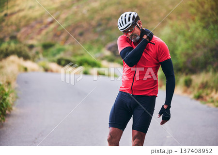 Man, cyclist and neck injury in nature accident, emergency or broken bone on mountain road. Male person or athlete with fitness pain, ache or inflammation on joint in sports fall or outdoor cycling Man, cyclist and neck injury in nature accident, emergency or broken bone on mountain road. Male person or athlete with fitness pain, ache or inflammation on joint in sports fall or outdoor cycling 137408952
