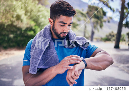 Pulse check, man and fitness watch with training results, towel and time monitoring of run outdoor. Runner, workout app, heart rate and athlete progress for sport and exercise on a road for health Pulse check, man and fitness watch with training results, towel and time monitoring of run outdoor. Runner, workout app, heart rate and athlete progress for sport and exercise on a road for health 137408956