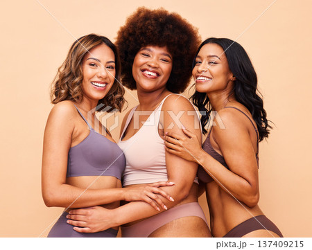 Diversity, natural beauty and portrait of happy women with smile, self love or body positivity in studio. Happy face, group of people on beige background in underwear, skincare inclusion in cosmetics 137409215
