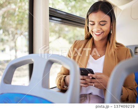 Business woman, happy and phone on bus, transport or travel in city with social media, online news or chat. Young person driving in metro or on urban journey for job, career and opportunity on mobile Business woman, happy and phone on bus, transport or travel in city with social media, online news or chat. Young person driving in metro or on urban journey for job, career and opportunity on mobile 137409219