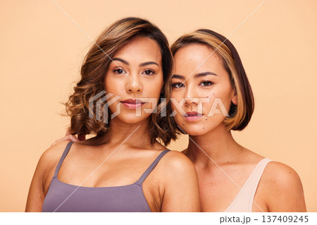 Beauty, diversity and portrait with women in studio for health, glow or cosmetics. Spa, self love and skincare with face of people on beige background for support, pride or solidarity on mockup space Beauty, diversity and portrait with women in studio for health, glow or cosmetics. Spa, self love and skincare with face of people on beige background for support, pride or solidarity on mockup space 137409245