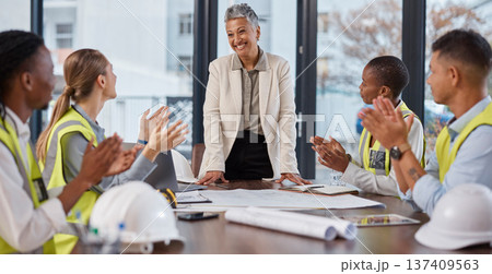 Applause, talking and construction workers in a meeting with a manager for architecture success. Happy, team and architects clapping for a presentation from a boss about infrastructure design 137409563