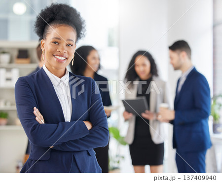 Crossed arms, confidence and portrait of professional black woman in the office with a smile. Happy, career and young African female attorney with pride standing by a legal team in the workplace. 137409940