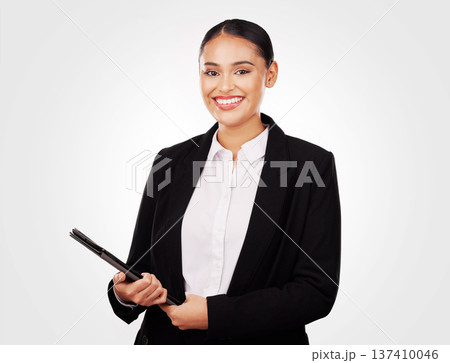 Tablet, smile and portrait of businesswoman in a studio to scroll on the internet, website or blog. Happy, digital technology and professional lawyer with confidence for research by white background. 137410046