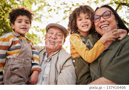 Grandparents, children and portrait with a smile in park, garden or happy family relax together outdoor in backyard. Kids, hug grandmother and grandfather in nature on holiday or vacation with love 137410406