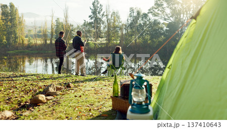 Fishing, camping and friends by lake in nature on holiday, adventure and vacation together outdoors. Campsite, relax and men and woman with rod by river for sports hobby, activity and catch fish Fishing, camping and friends by lake in nature on holiday, adventure and vacation together outdoors. Campsite, relax and men and woman with rod by river for sports hobby, activity and catch fish 137410643