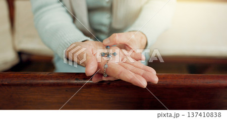 Rosary, prayer or hands of woman in church for God, holy spirit or religion with faith in Christian cathedral. Jewelry closeup, spiritual lady or person in chapel praying to praise Jesus Christ alone Rosary, prayer or hands of woman in church for God, holy spirit or religion with faith in Christian cathedral. Jewelry closeup, spiritual lady or person in chapel praying to praise Jesus Christ alone 137410838