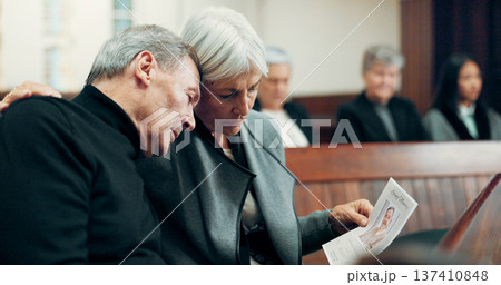 Couple, funeral or sad old man crying in church for God, healing or comfort in Christian community. Elderly woman, depressed or support for an upset mature person in chapel for grief, loss or death Couple, funeral or sad old man crying in church for God, healing or comfort in Christian community. Elderly woman, depressed or support for an upset mature person in chapel for grief, loss or death 137410848