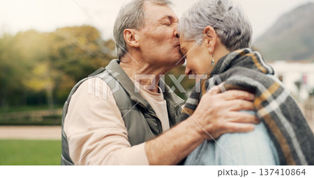 Forehead, kiss and senior couple in a park with love, happy and conversation with romantic bonding. Kissing, old people and elderly man embrace woman with care, romance or soulmate connection outdoor Forehead, kiss and senior couple in a park with love, happy and conversation with romantic bonding. Kissing, old people and elderly man embrace woman with care, romance or soulmate connection outdoor 137410864