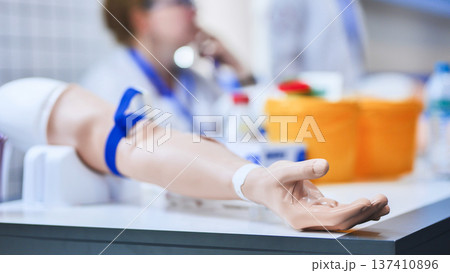 Medical training mannequin arm for phlebotomy education and blood draw practice Medical training mannequin arm for phlebotomy education and blood draw practice 137410896